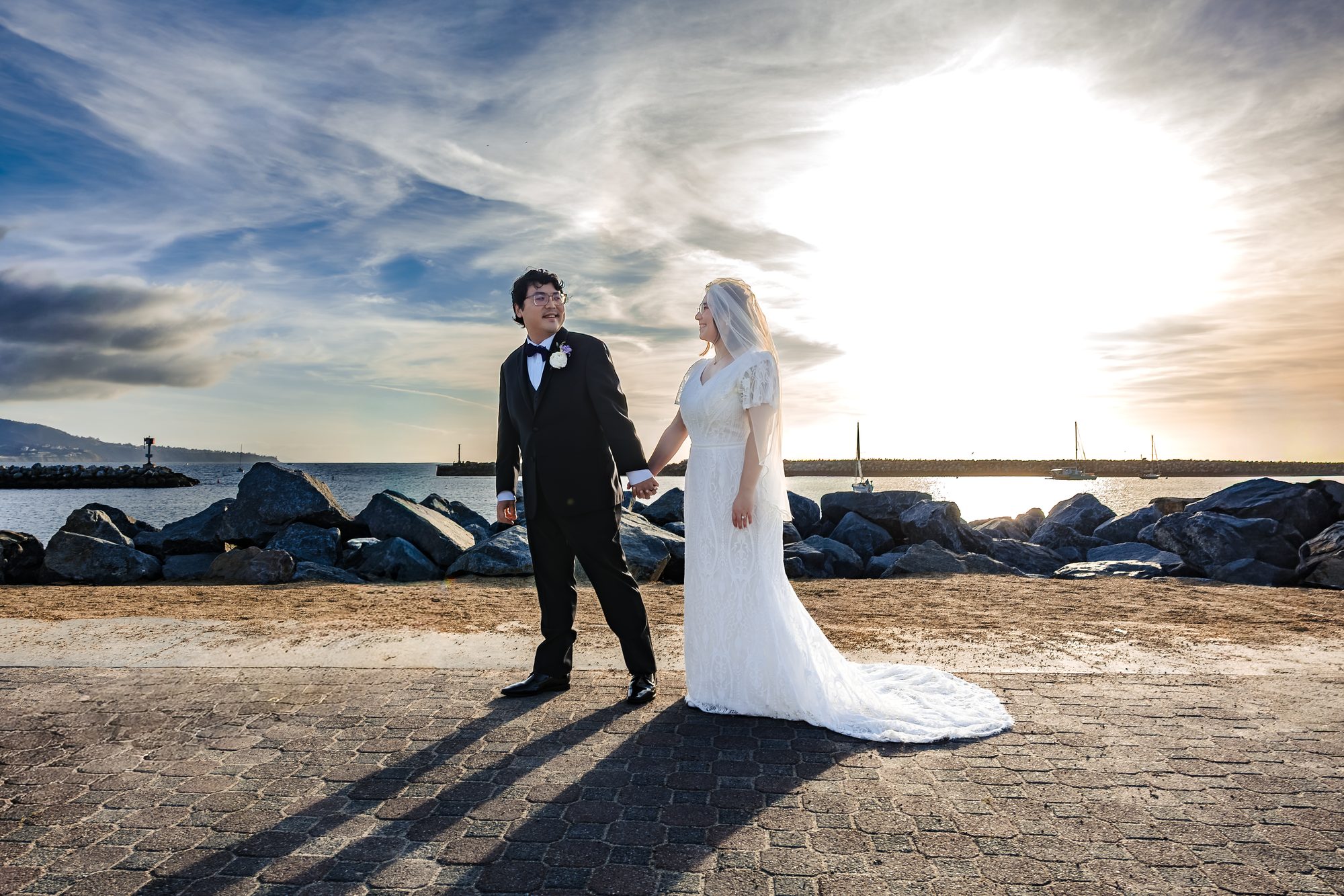 A Catholic couple on the coast at Hermosa Beach after their nuptial Mass