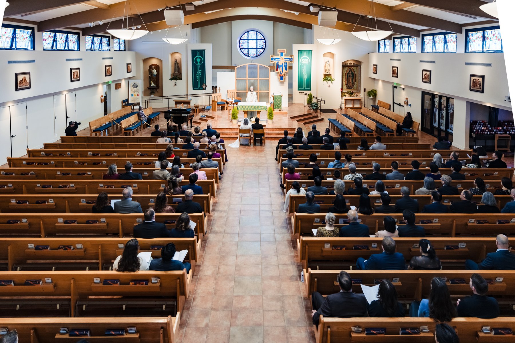 Wide view of a Catholic wedding Mass at Our Lady of Guadalupe Catholic Church in Hermosa Beach