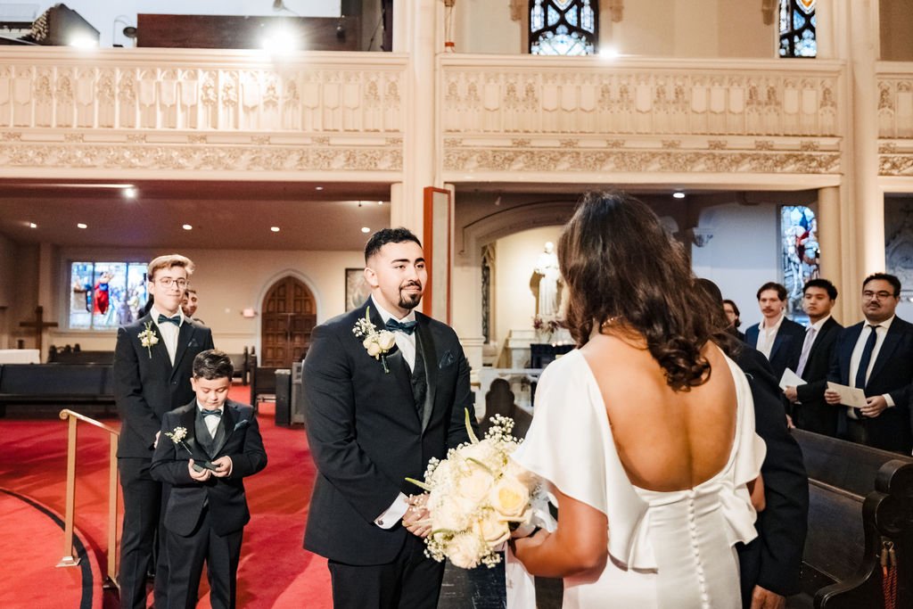 Bride and groom meet at the altar of Old St. Mary's Cathedral in San Francisco