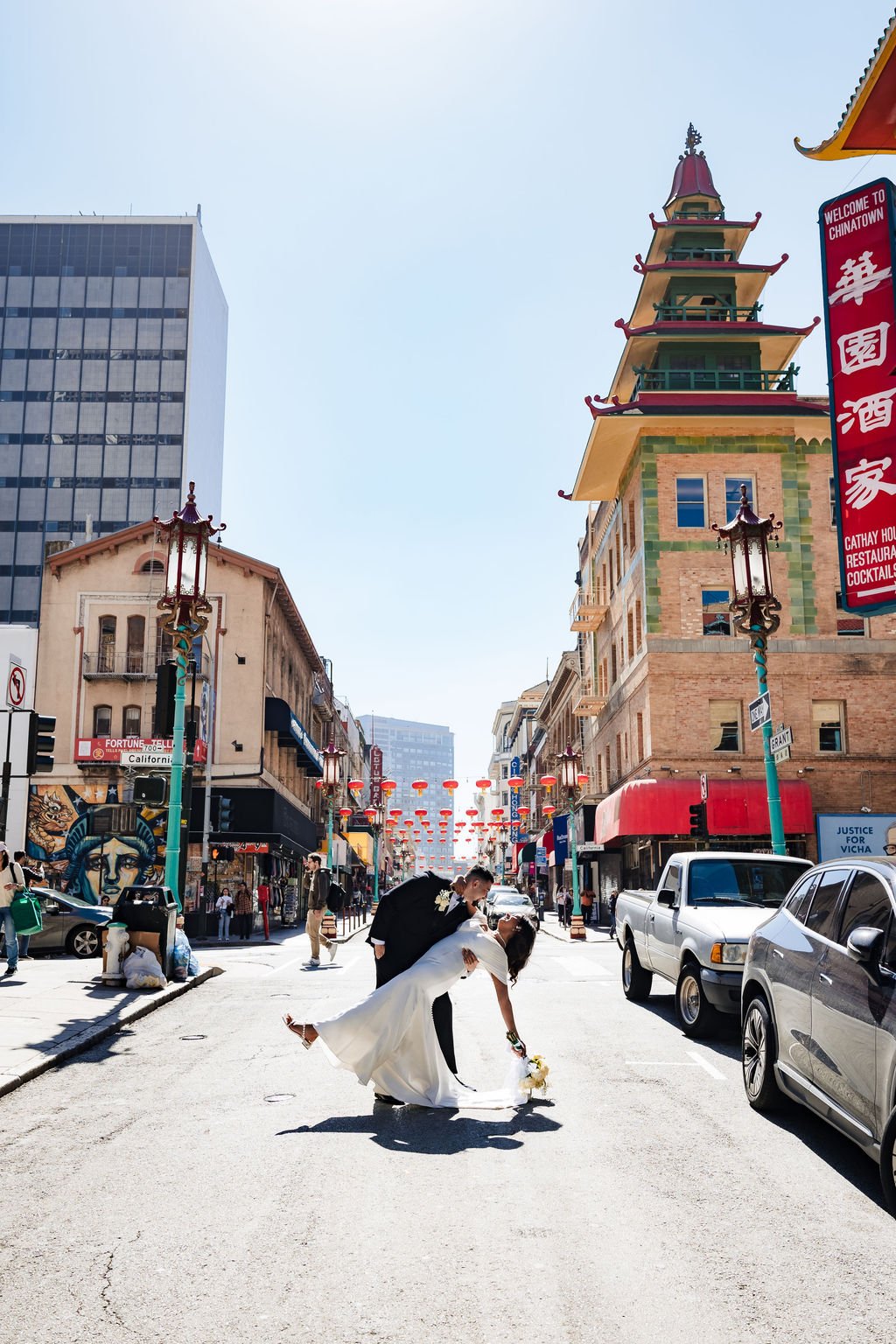 Wedding portrait in San Francisco's Chinatown after a Catholic wedding at Old St. Mary's Cathedral