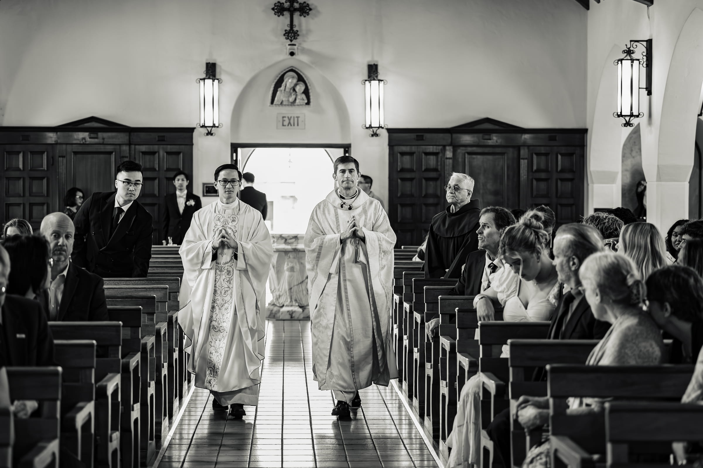 Matthew and Maya's Catholic wedding at St. Mary's Star of the Sea in La Jolla — the bride arriving at the altar