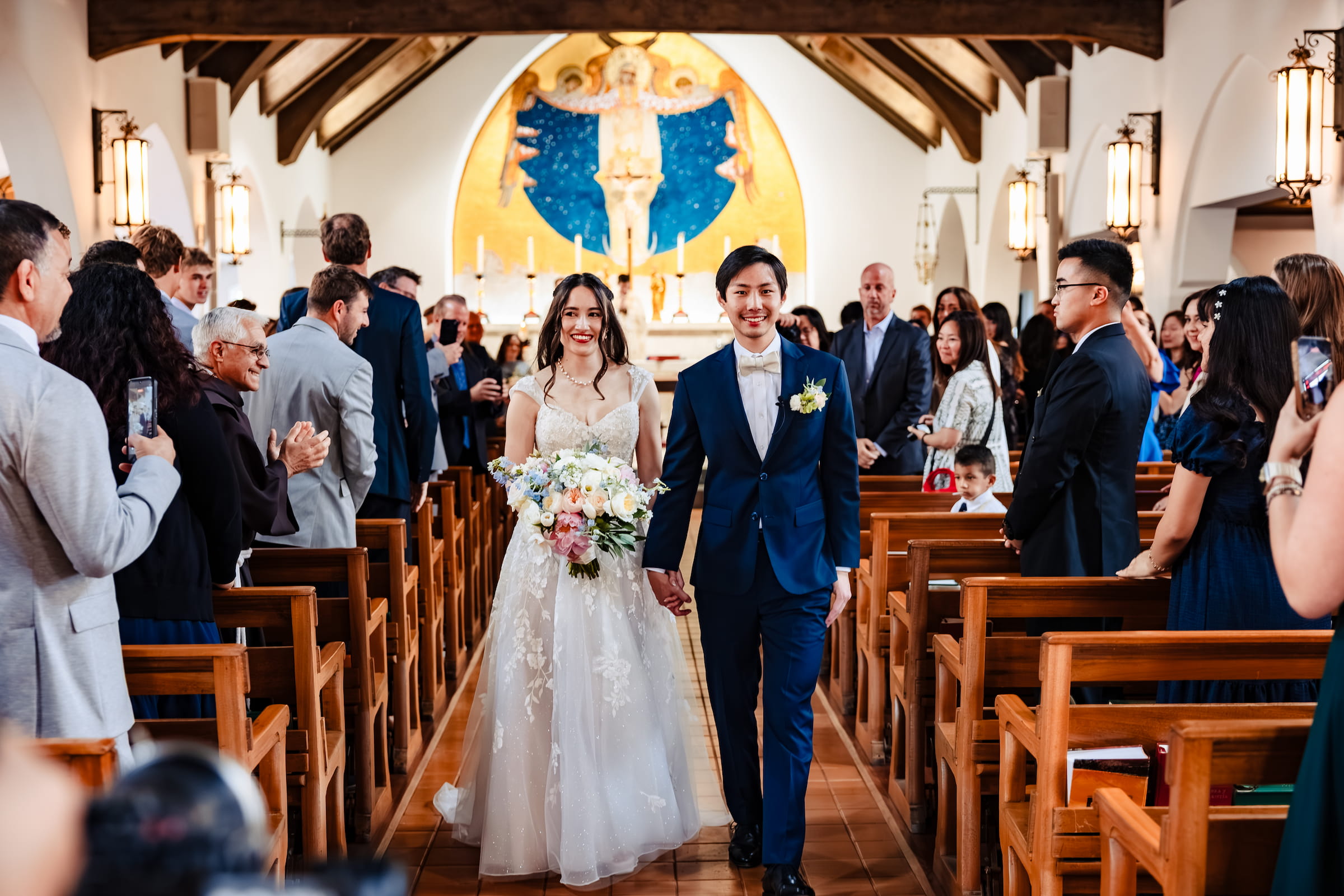 Matthew and Maya's Catholic wedding at St. Mary's Star of the Sea in La Jolla — first Communion received as husband and wife