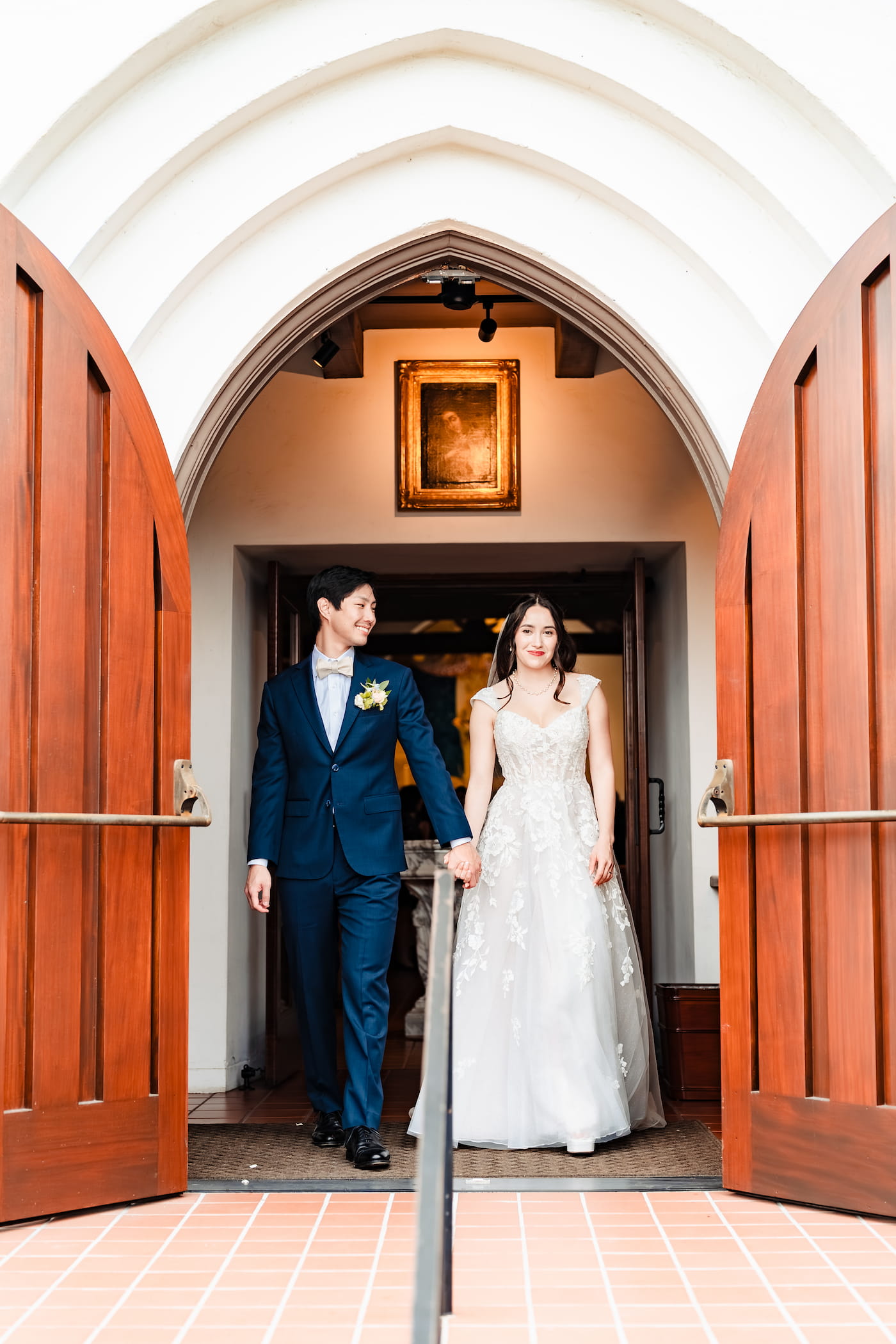 Matthew and Maya's Catholic wedding at St. Mary's Star of the Sea in La Jolla — reception of the Eucharist at the altar
