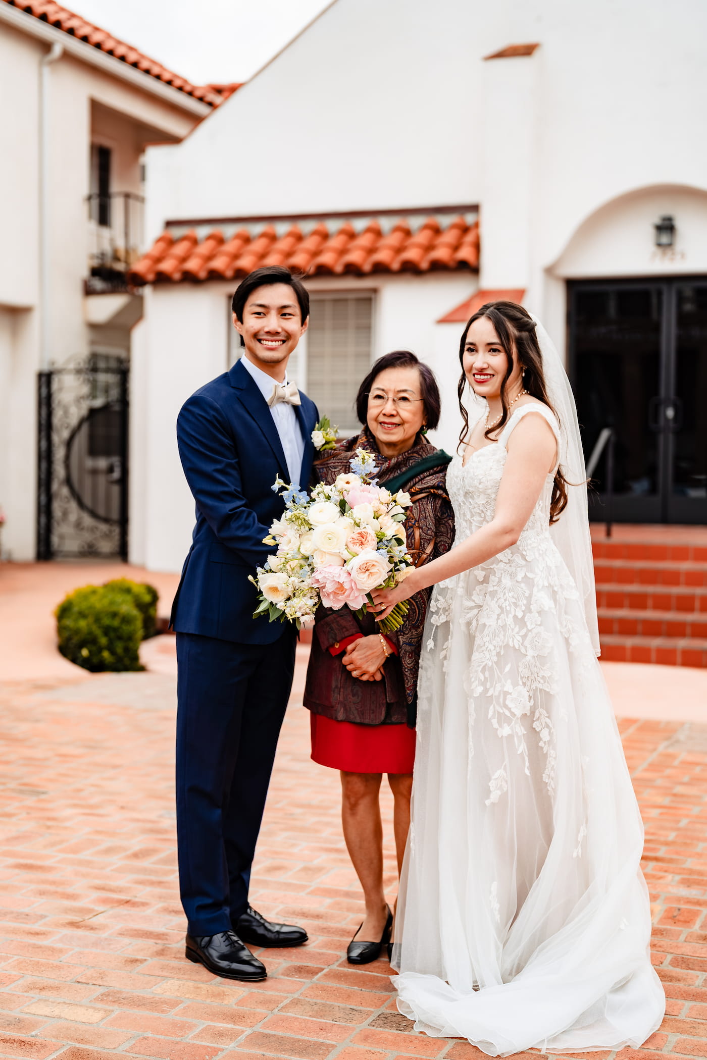 Matthew and Maya's Catholic wedding at St. Mary's Star of the Sea in La Jolla — the recessional after the Catholic wedding Mass