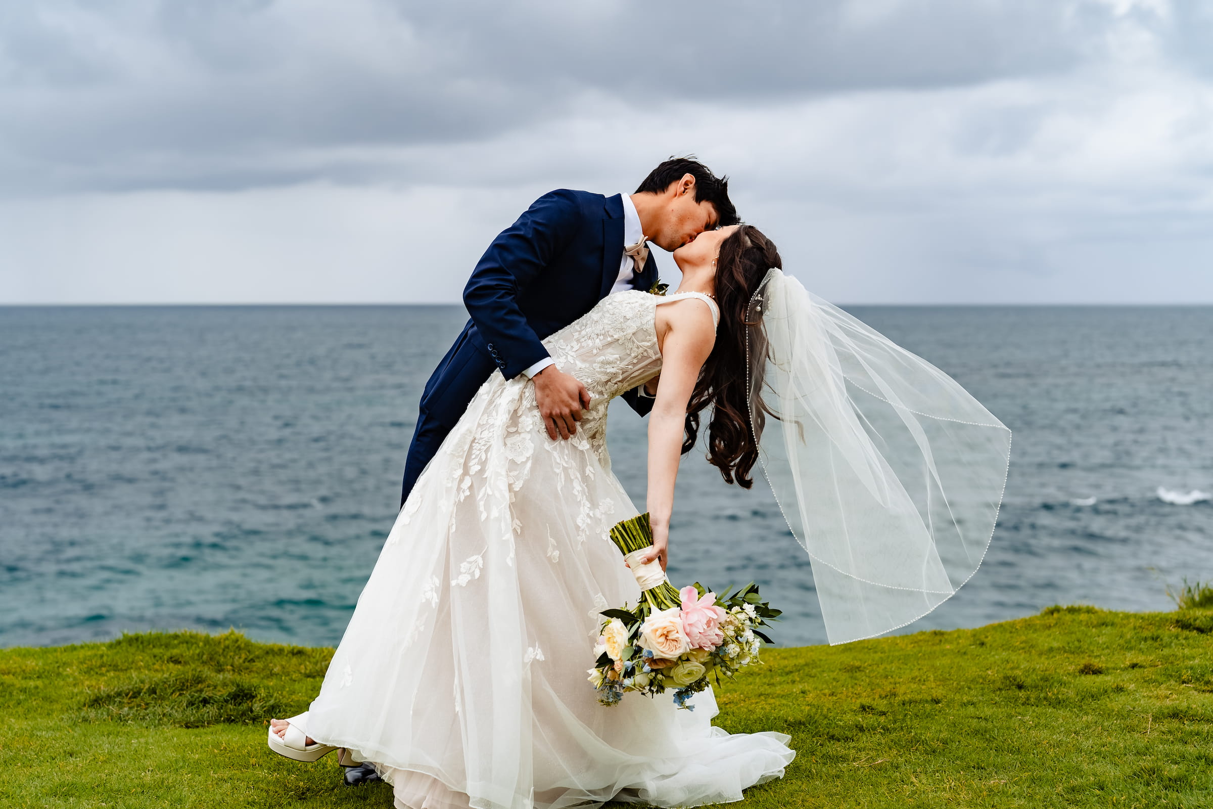 Matthew and Maya's Catholic wedding at St. Mary's Star of the Sea in La Jolla — congratulations after the Mass