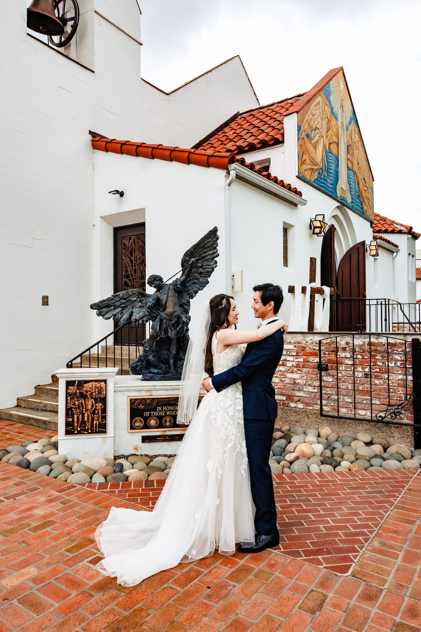 Matthew and Maya's Catholic wedding at St. Mary's Star of the Sea in La Jolla — the newly married couple at the parish