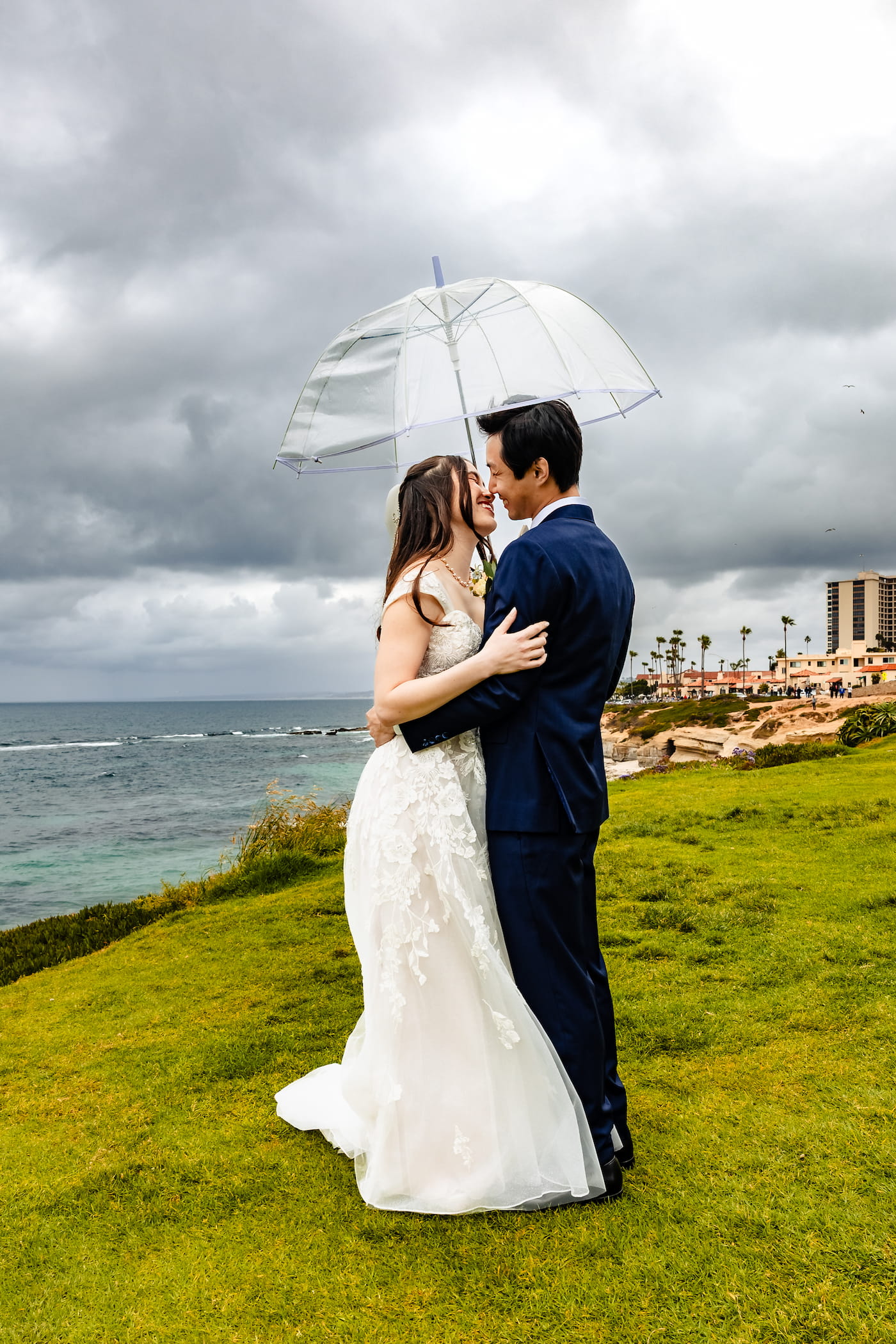 Matthew and Maya's Catholic wedding at St. Mary's Star of the Sea in La Jolla — a quiet portrait of the bride and groom