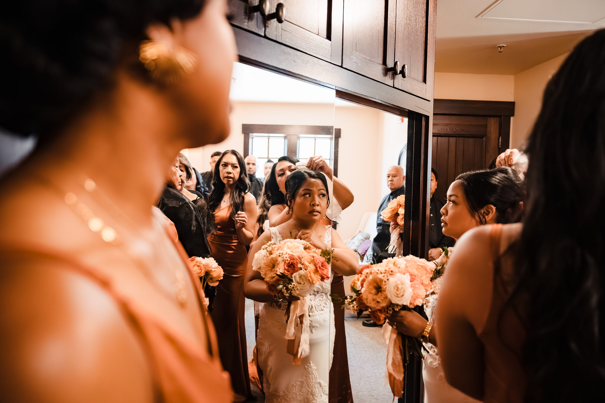 Bride and bridal party getting ready before the Catholic nuptial Mass in Winters