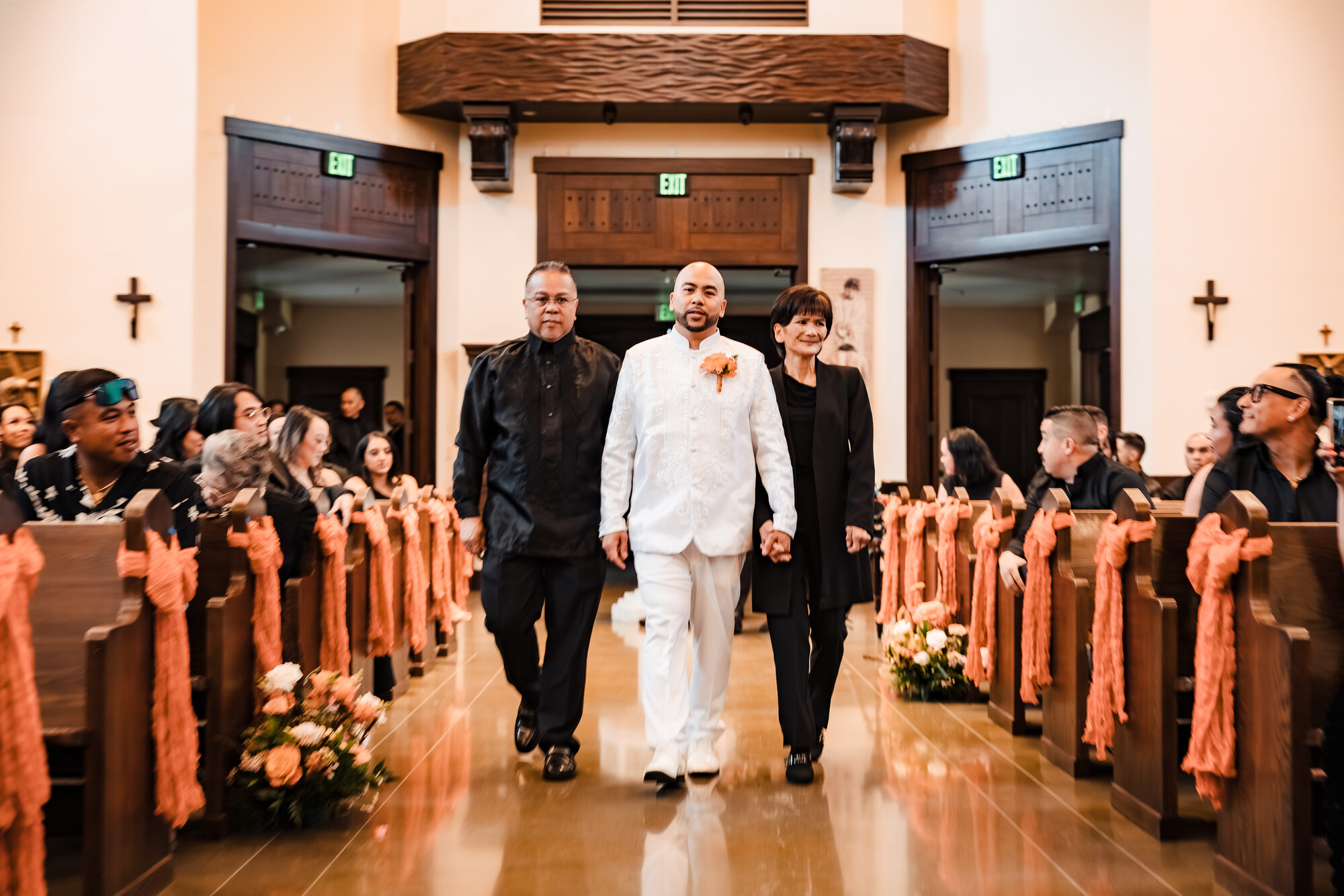 Father walking the groom down the aisle at a Catholic wedding in Winters, California