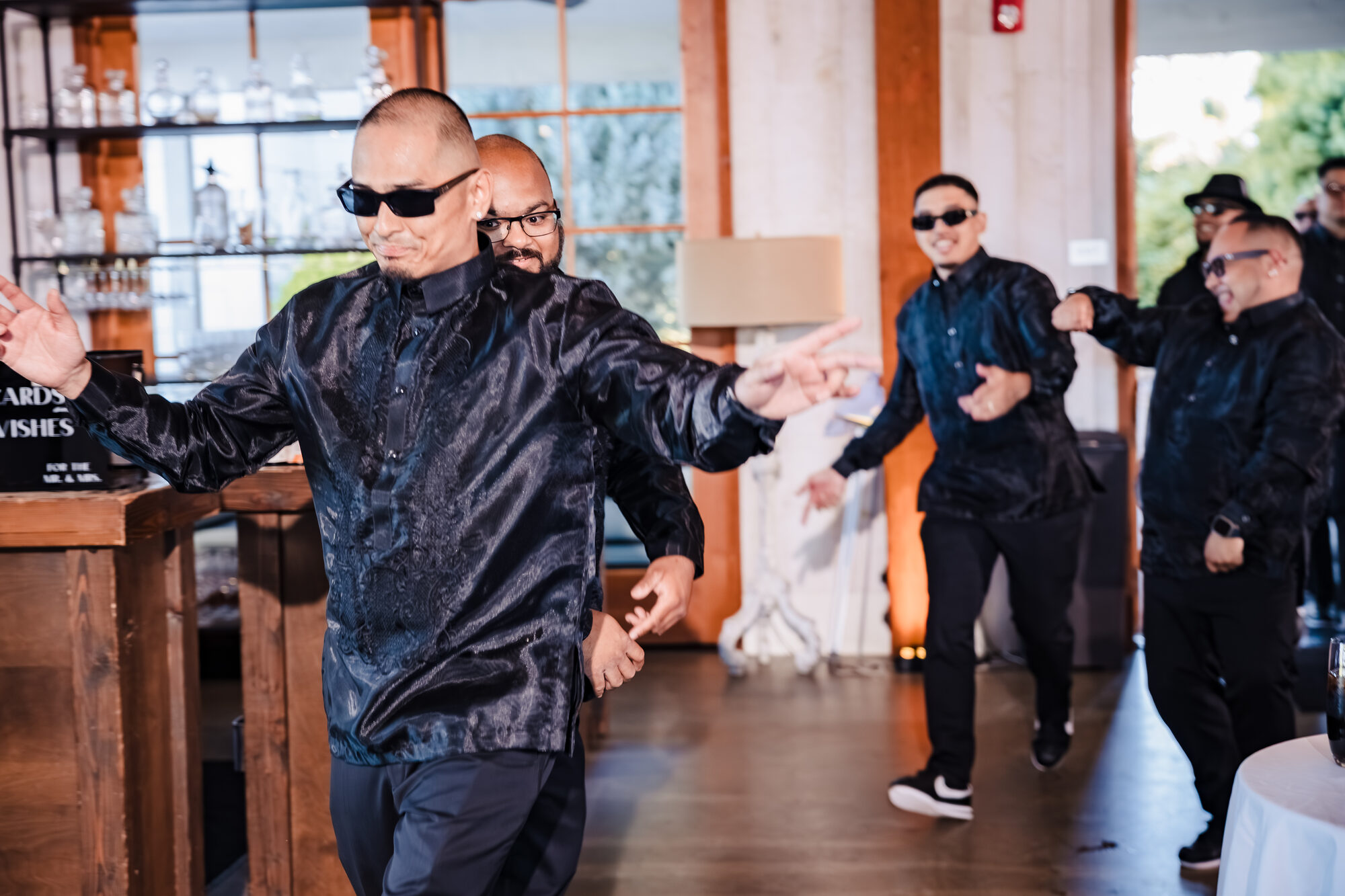 Groomsmen dancing into the Park Winters reception during the grand entrance