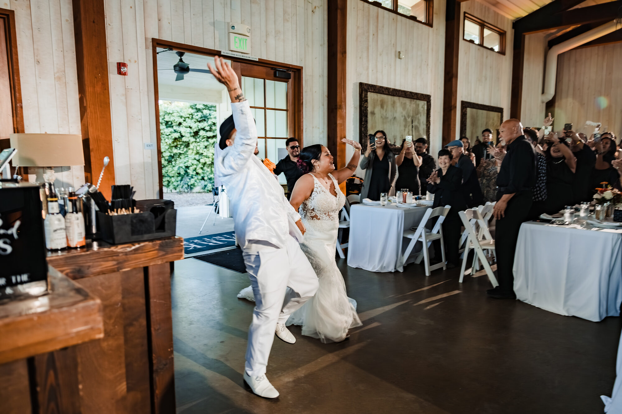 Bride and groom's grand entrance into the Park Winters reception