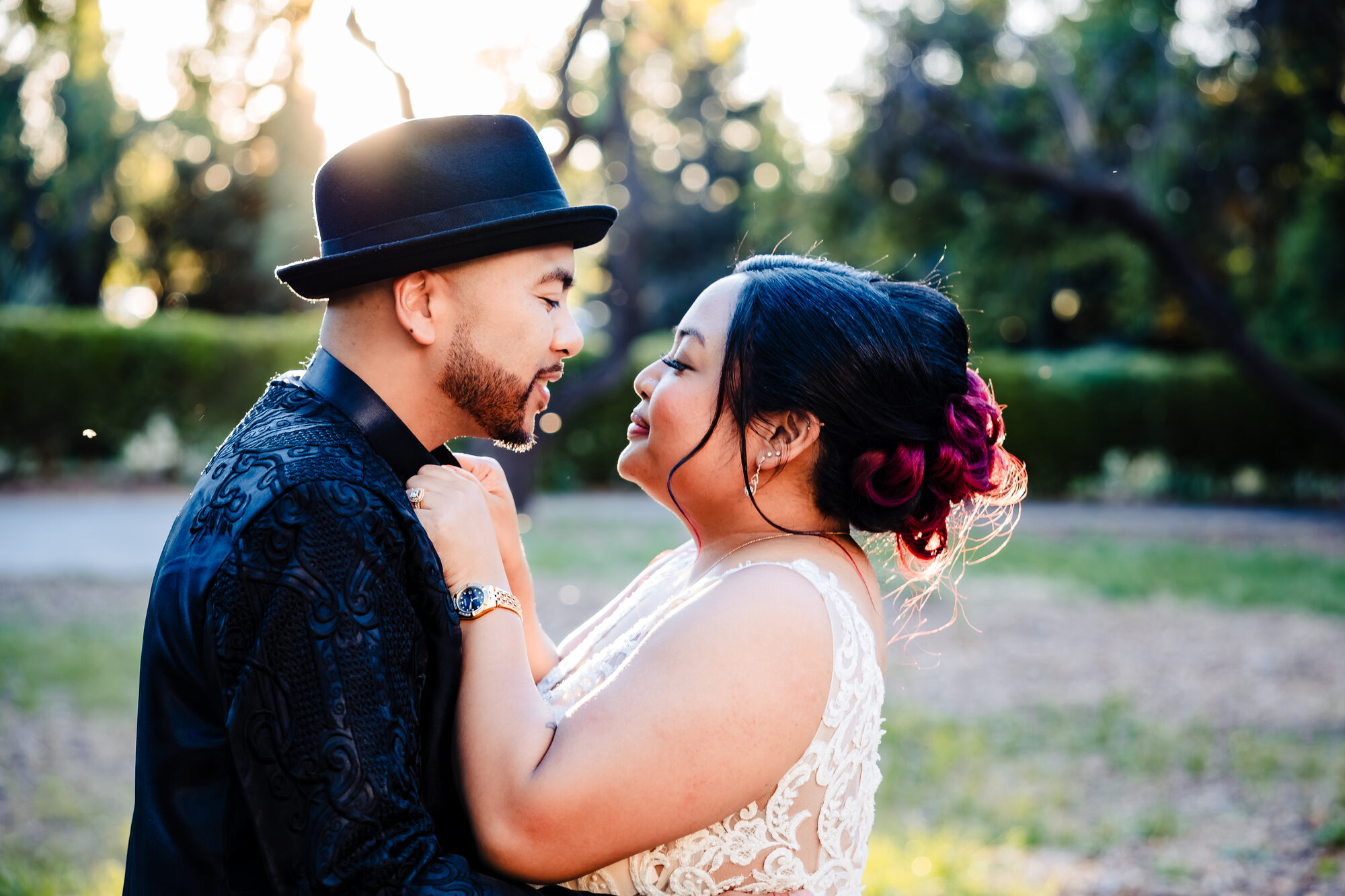 Bride and groom at golden hour outside the Park Winters Victorian house