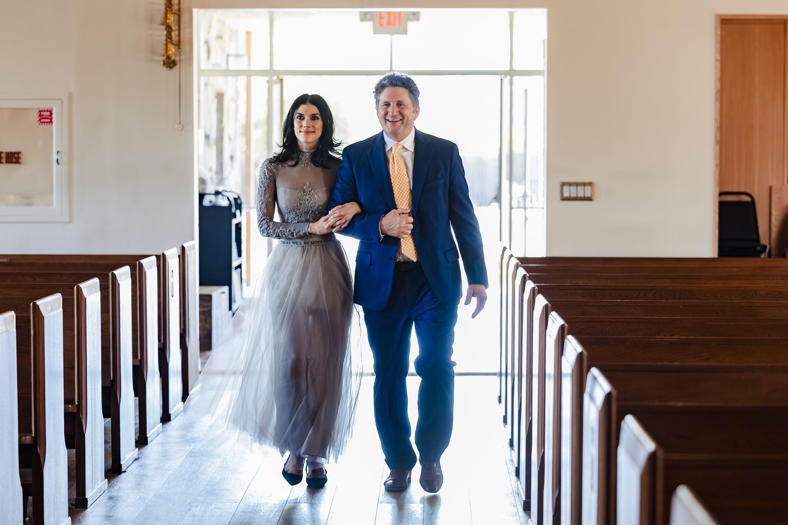 A couple processes into the church for their Catholic convalidation