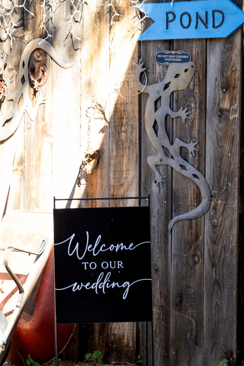 A welcome to our wedding sign beside the pond trail at Aspen Falls