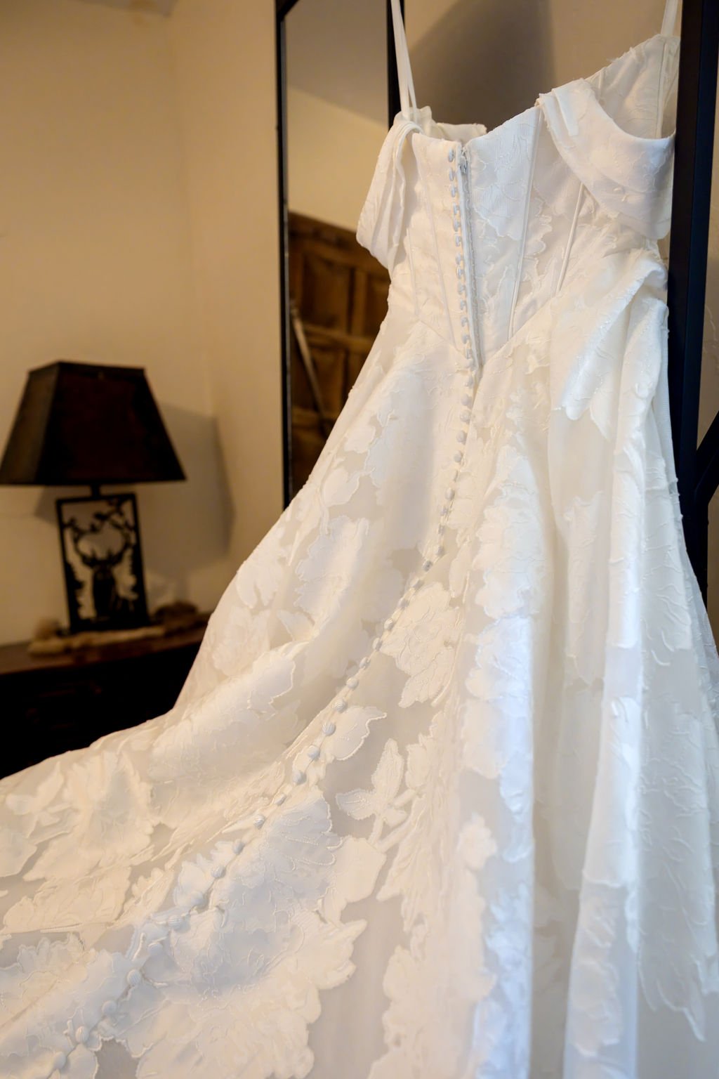 Detail of the gown's lace and buttons