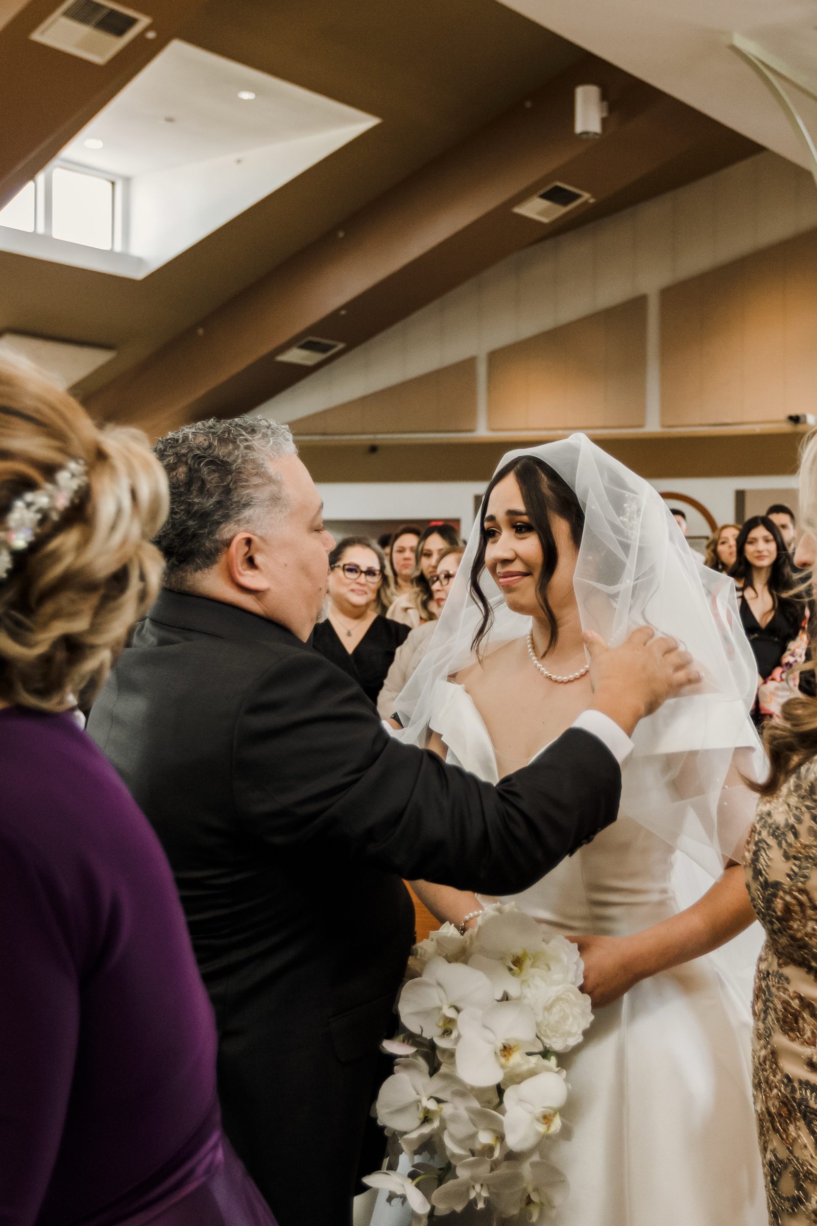 A father blessing his daughter before giving her away at La Purísima
