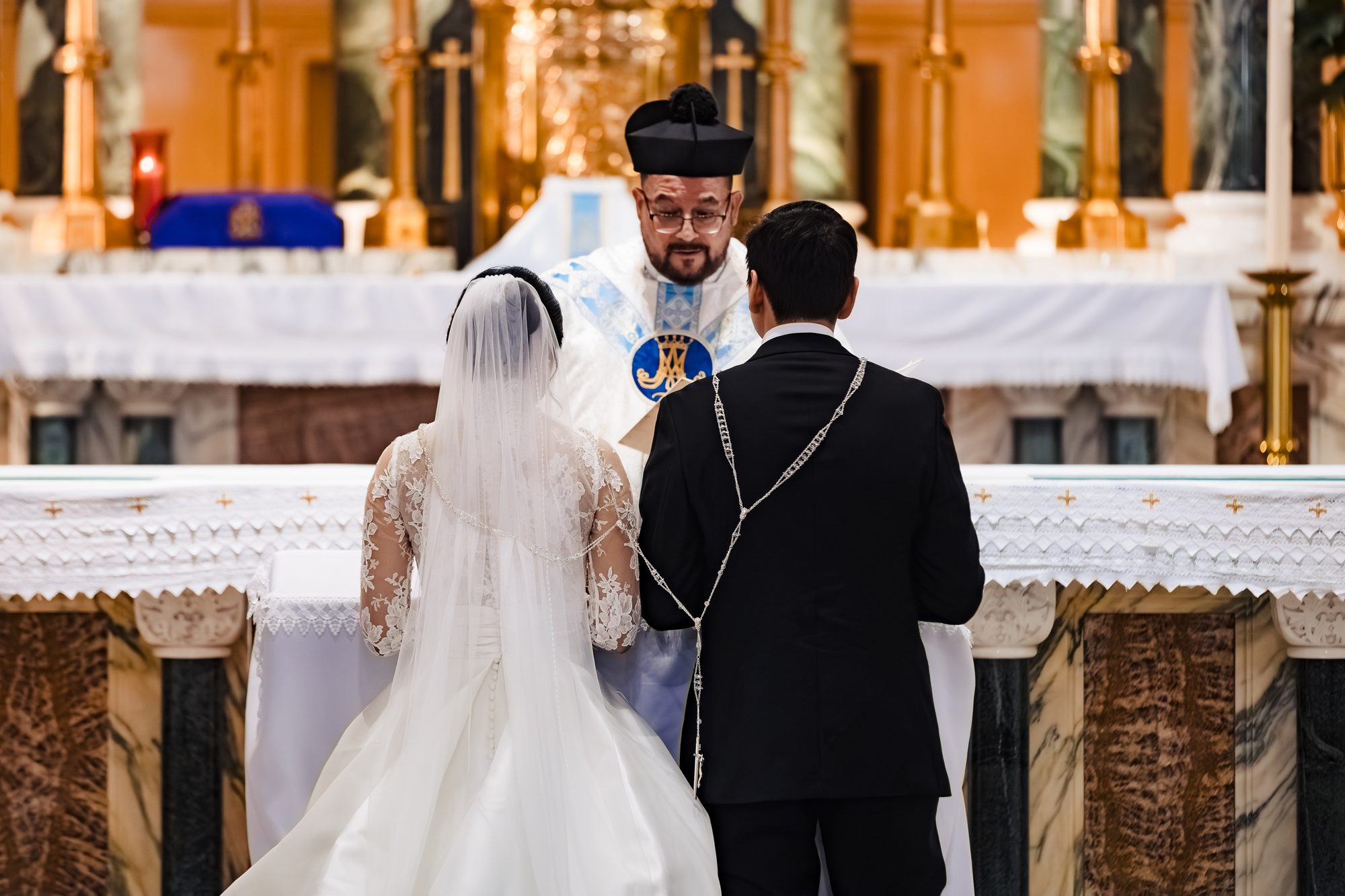 The couple at the altar during the liturgy