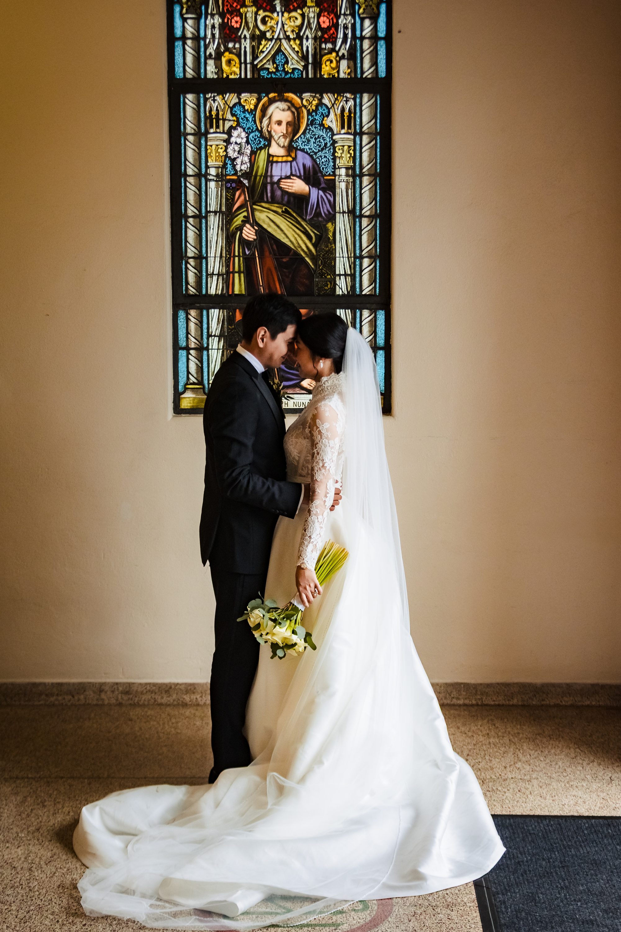 The couple in the rain outside Saint Joseph
