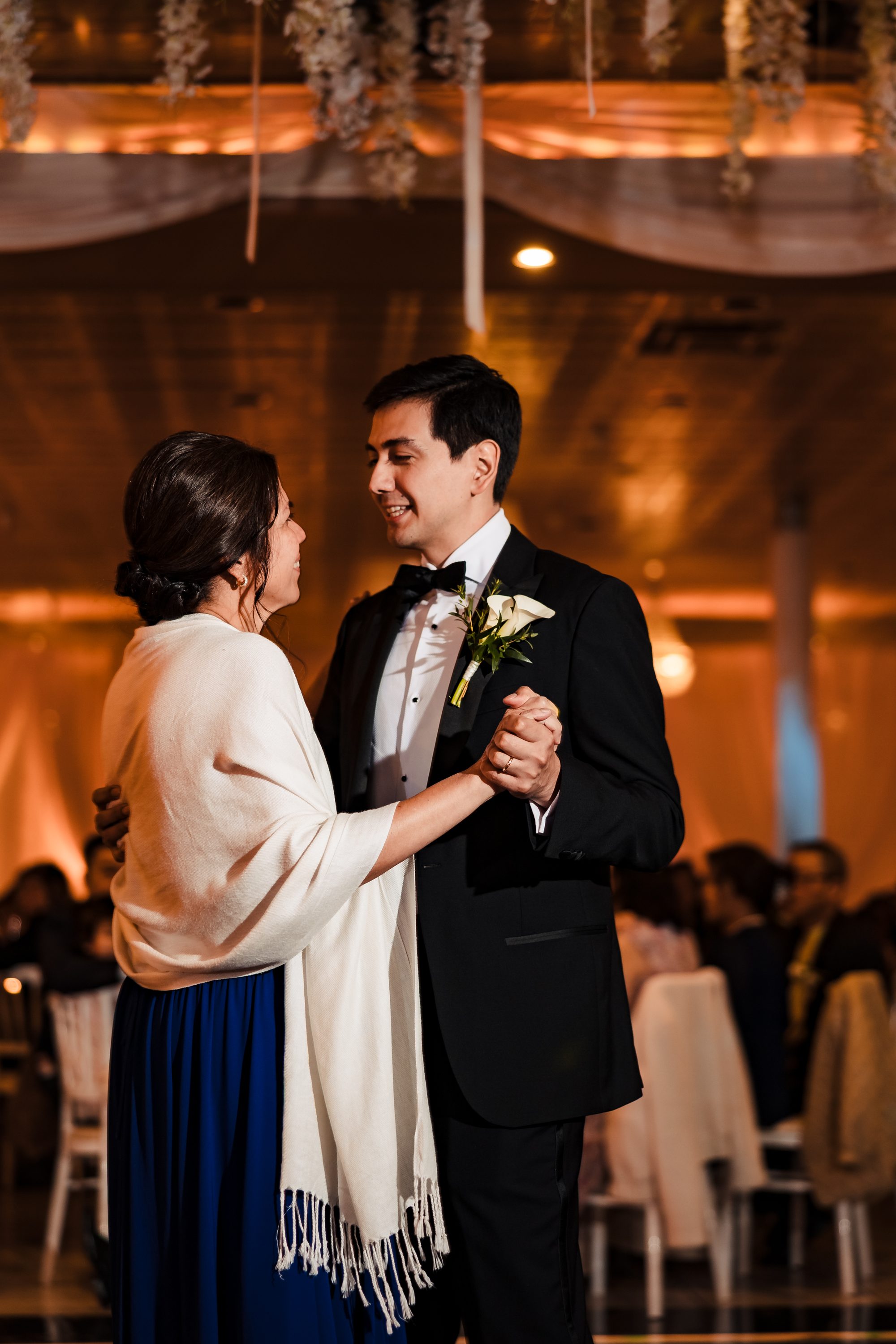 The first dance under the wisteria-draped ballroom ceiling