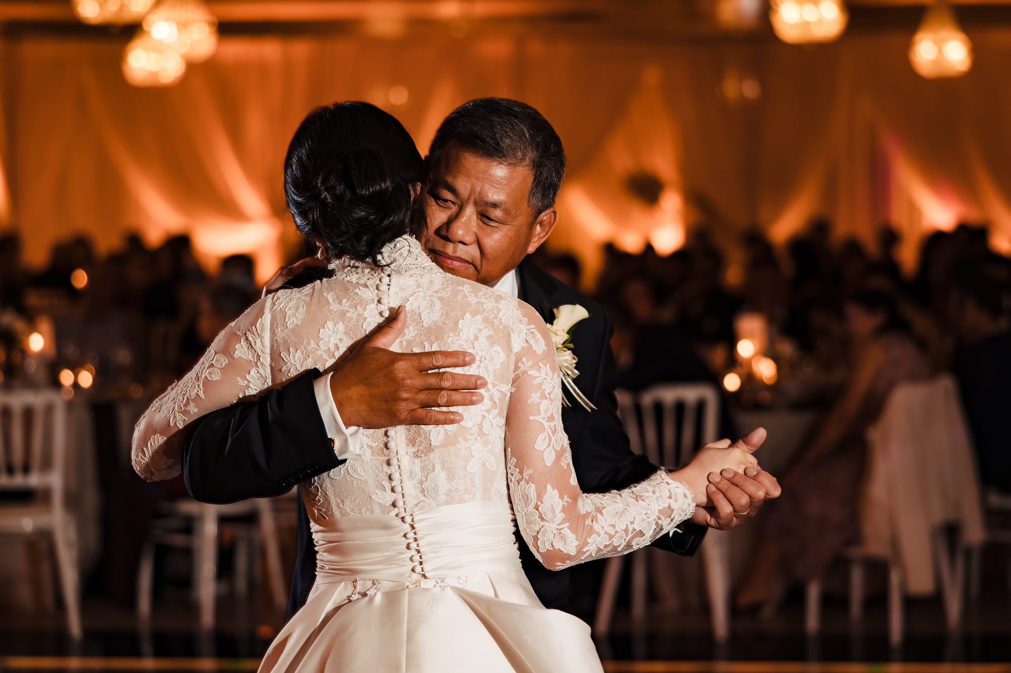 A toast at the candlelit reception