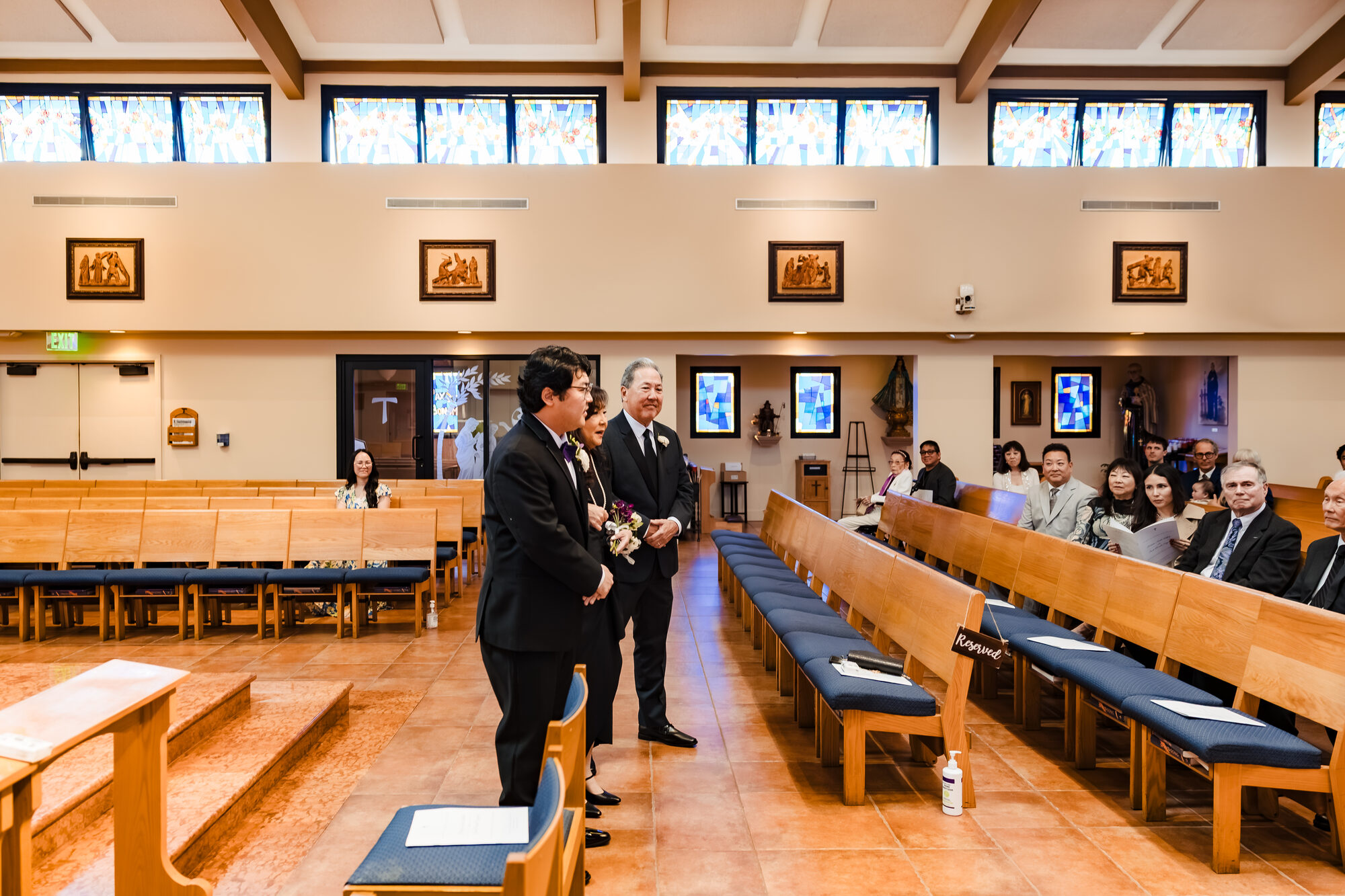 Groom processed to the altar by both parents at Our Lady of Guadalupe
