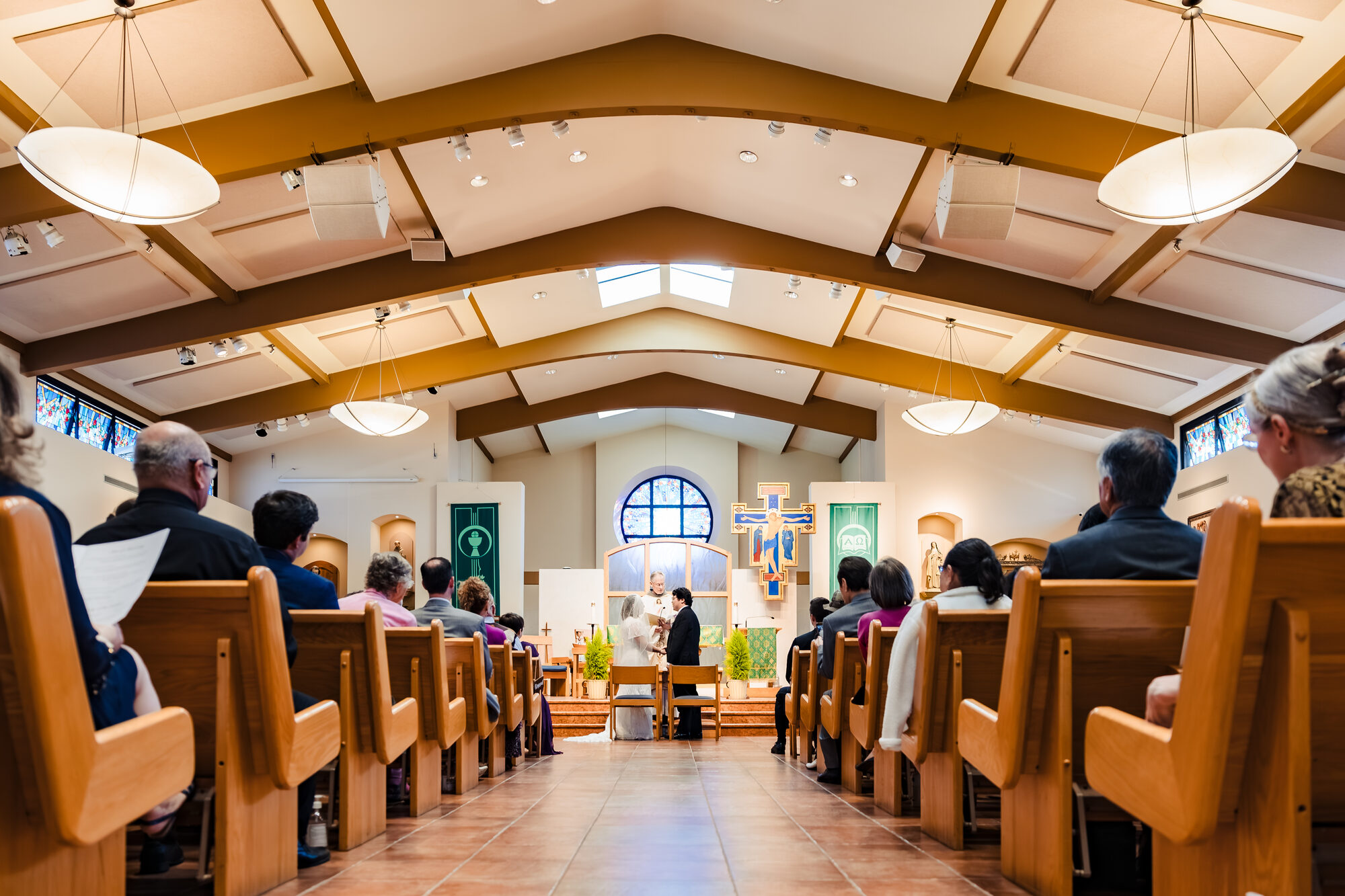 Exchange of vows before the priest at Our Lady of Guadalupe