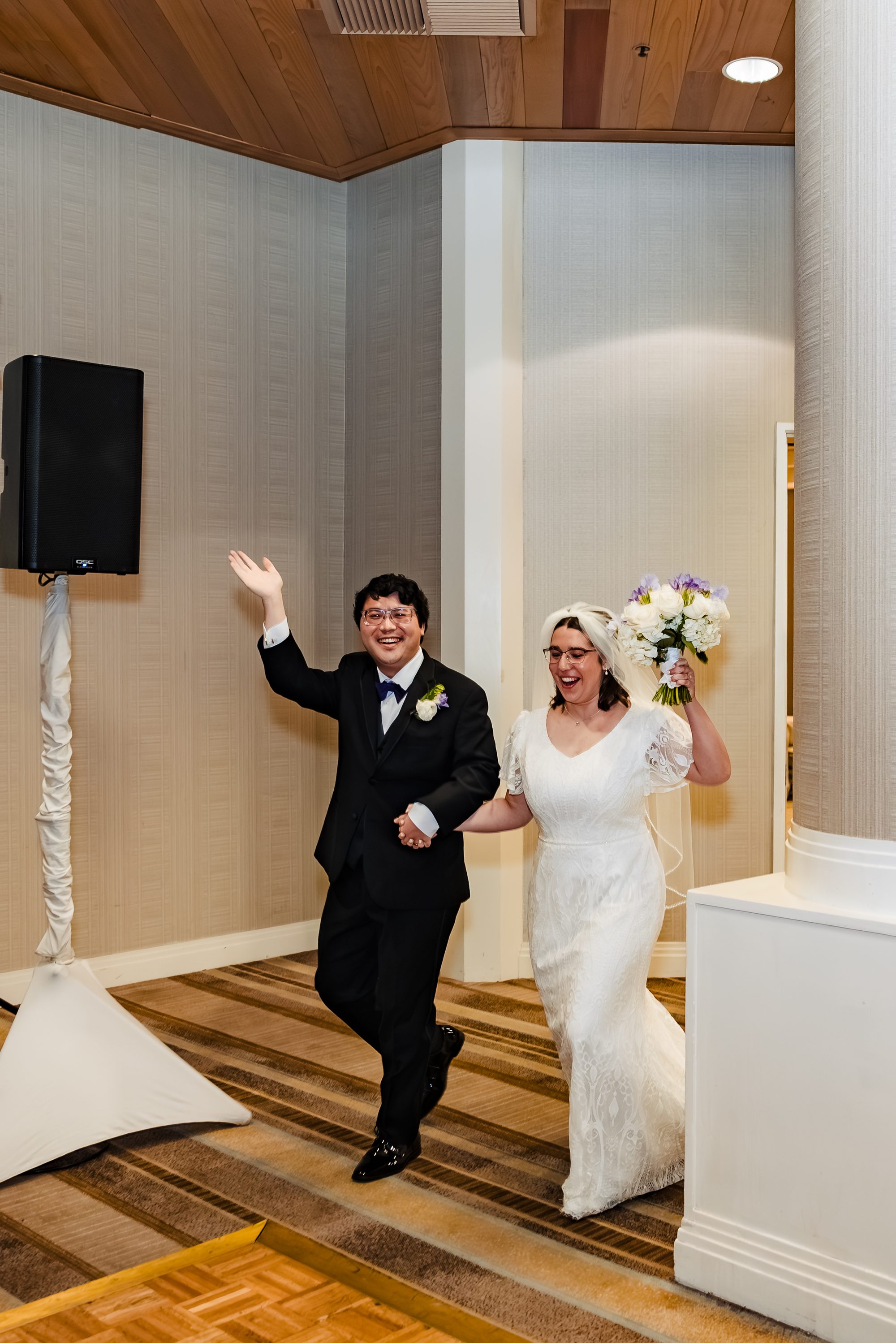 Brett and Kristen make their grand entrance into the Sonesta reception