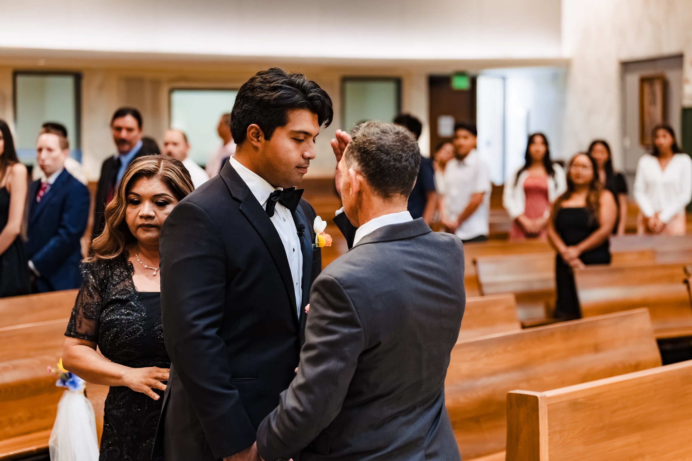 Diego's father blessing him with the sign of the cross before the Mass