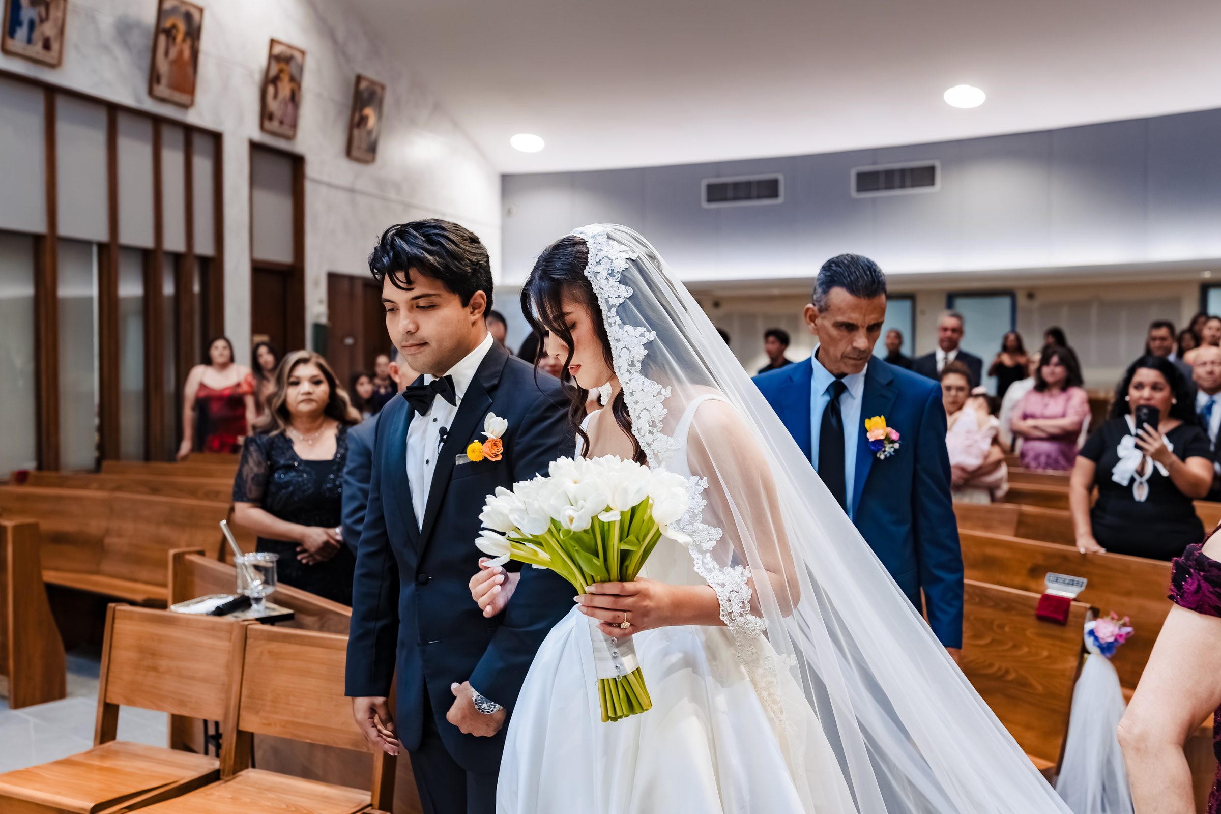 Diego receiving Judith as her veil falls behind her