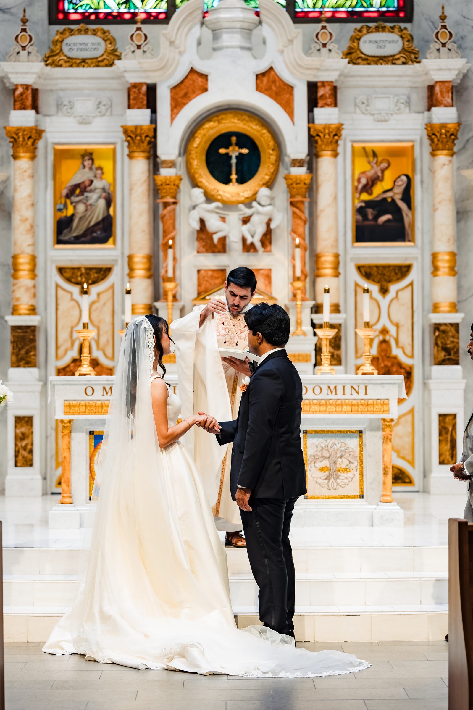 Diego and Judith exchanging vows at the altar