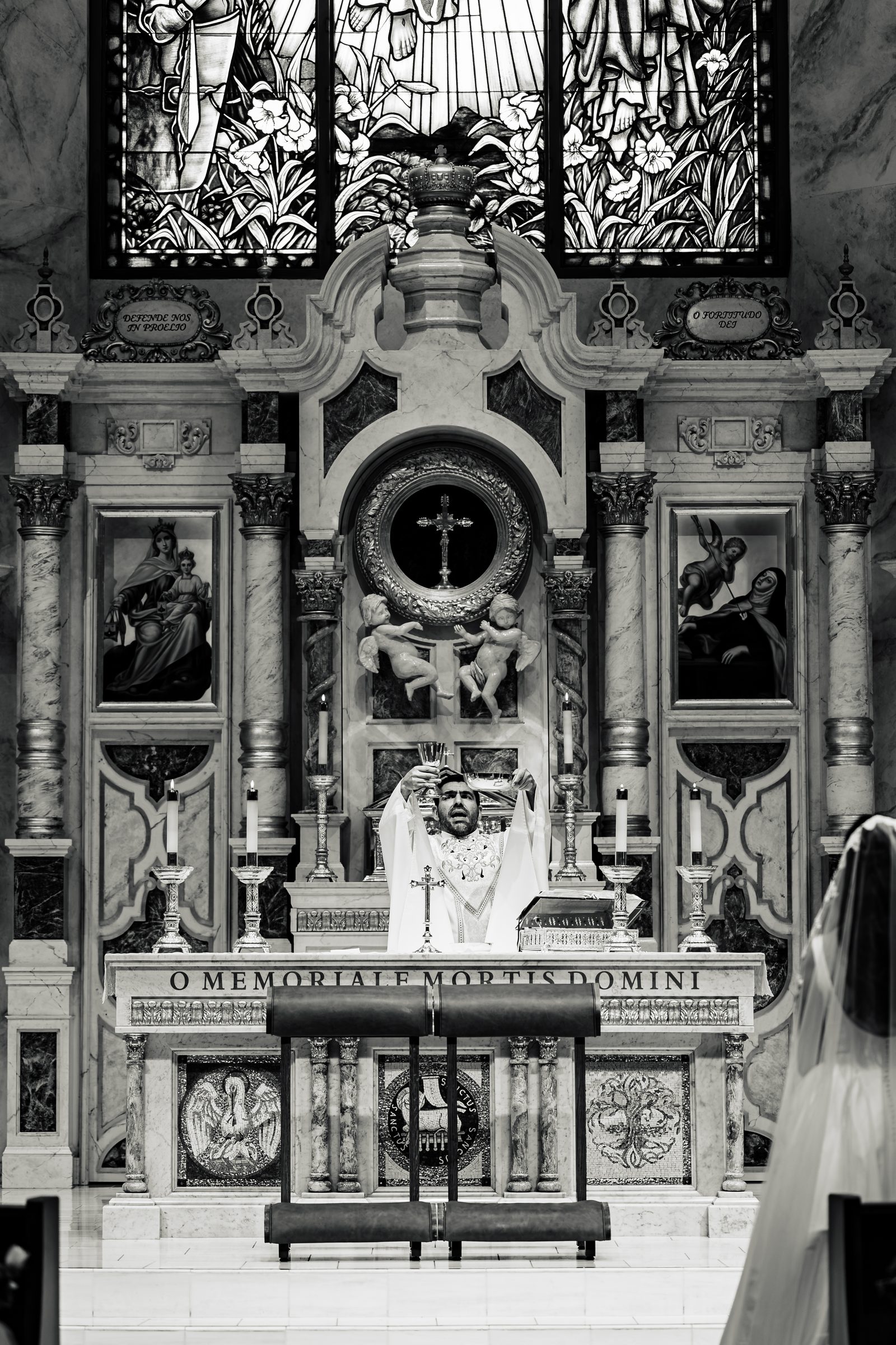 Black and white of the elevation beneath the stained glass and reredos