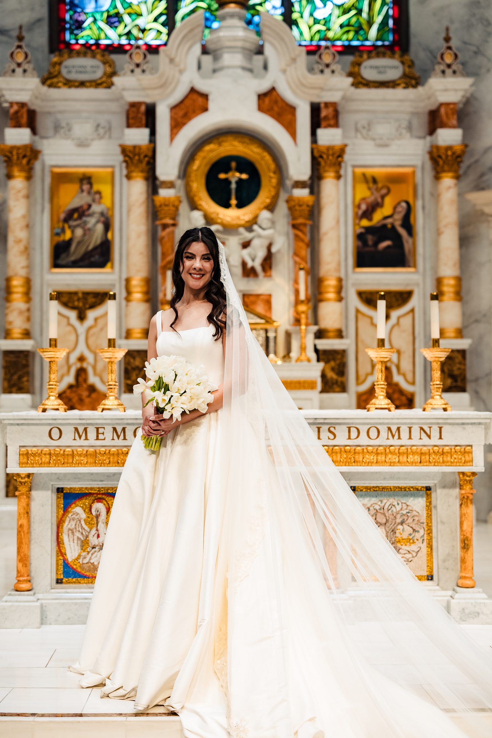 Bridal portrait before the gilded altar at Saint Martin de Porres