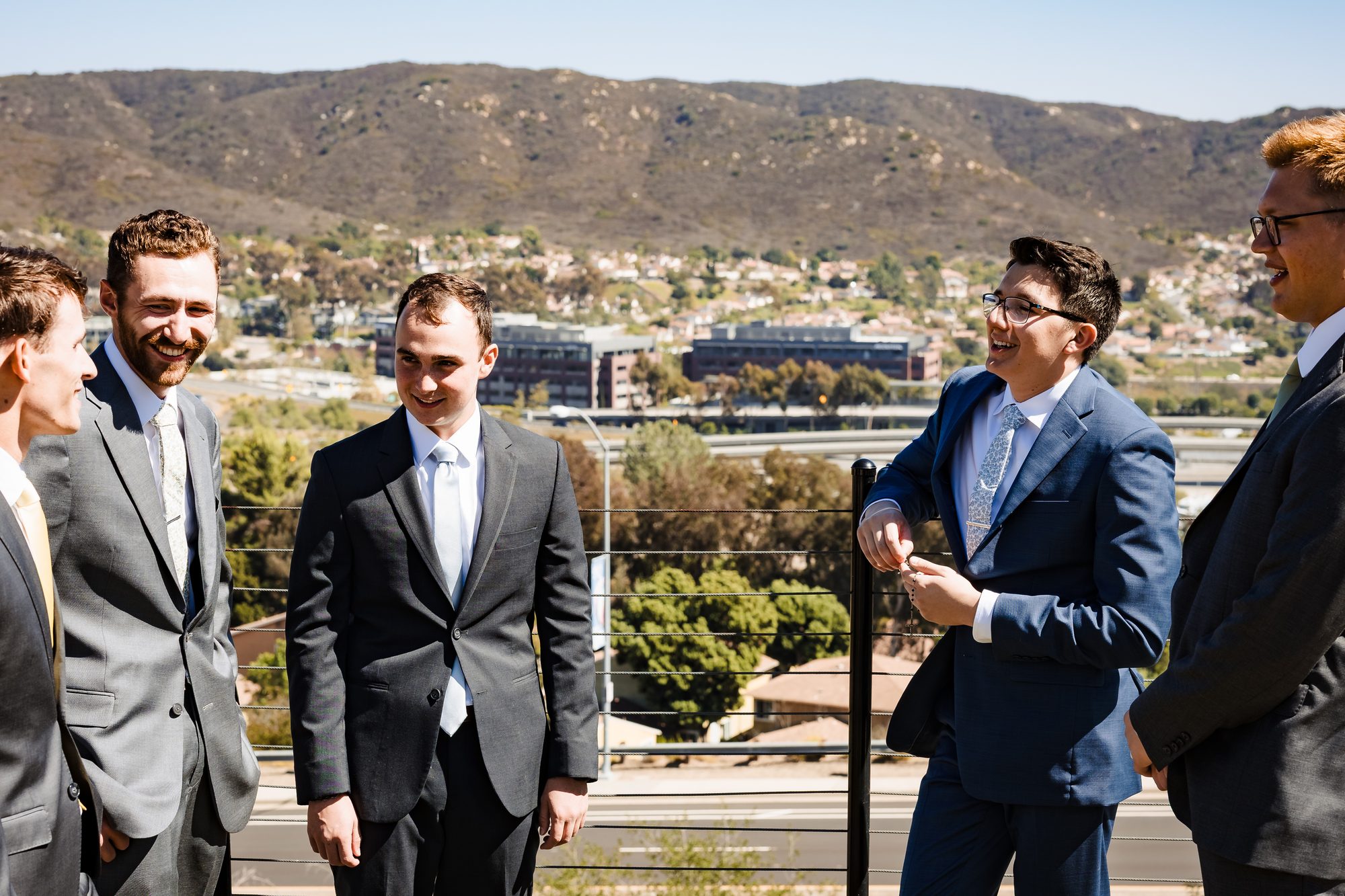 Groomsmen laughing together before the ceremony