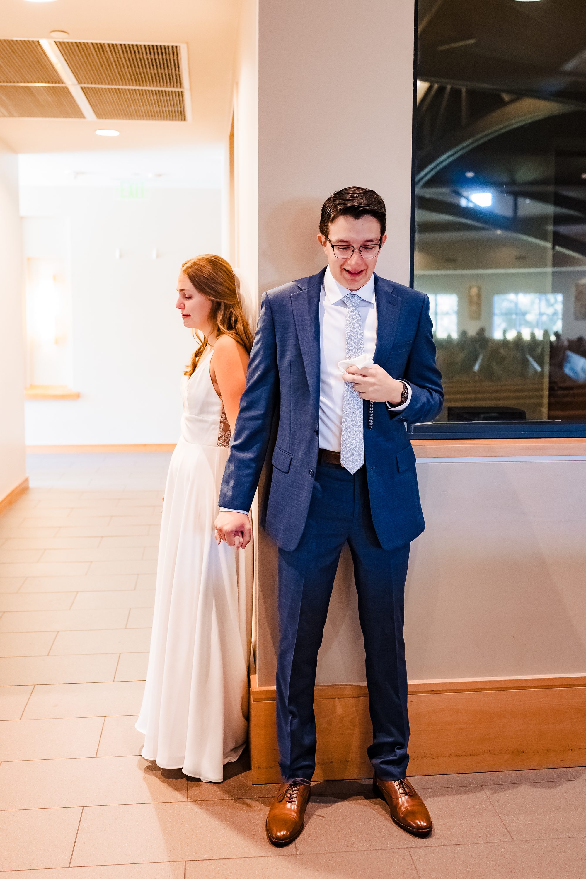 Annie's father waits in the narthex for the first look
