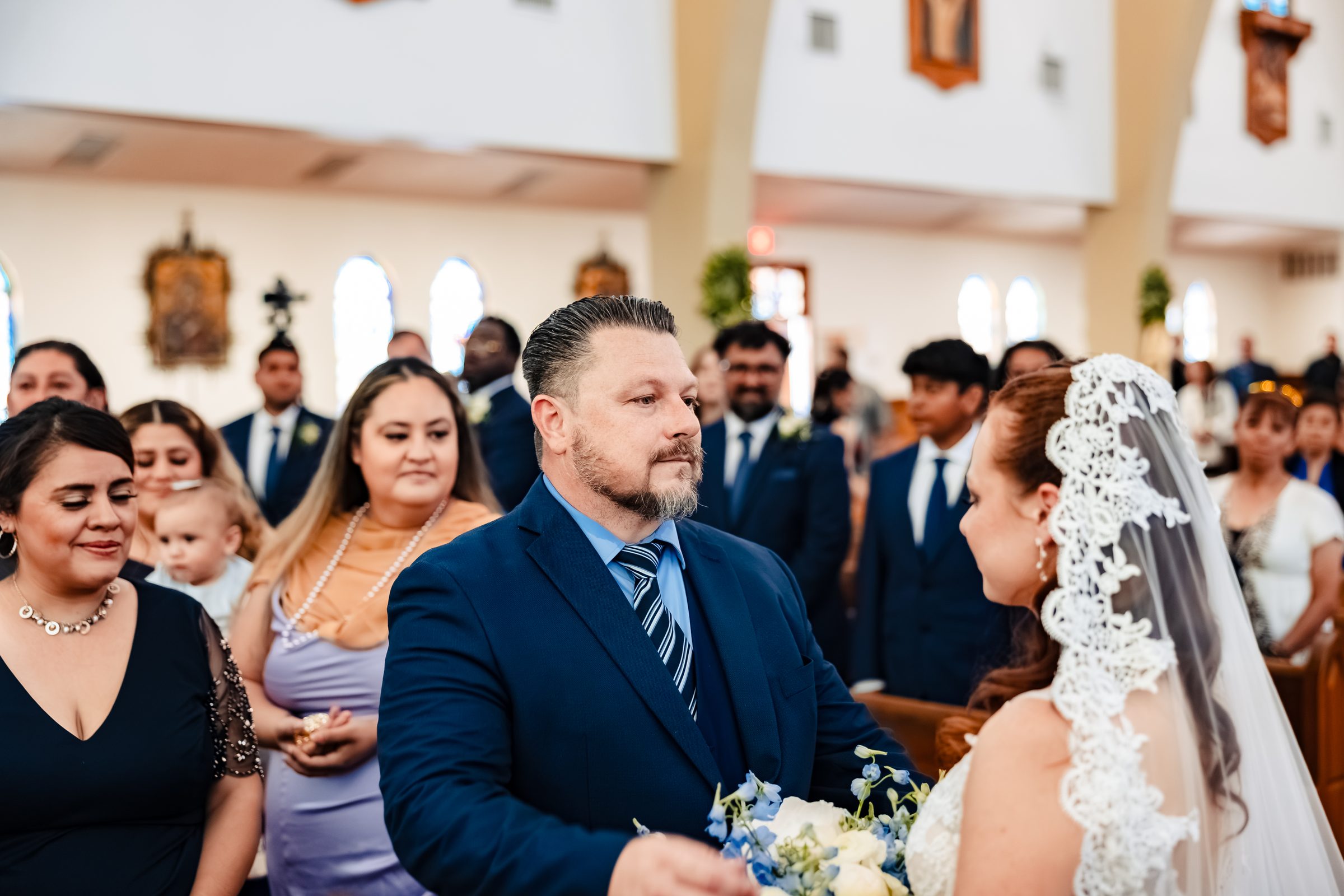 Brittany's father escorting her down the aisle at Saint Anne's, Santa Ana