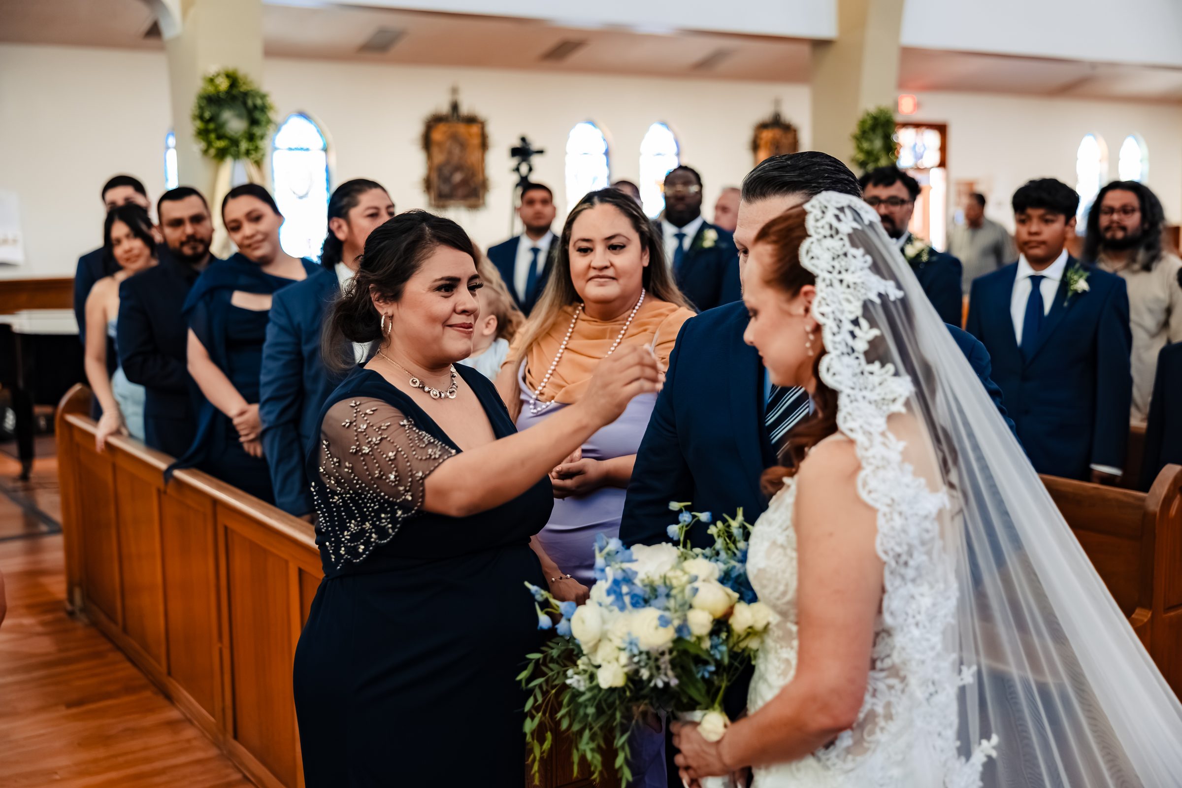 A mother's blessing during the processional