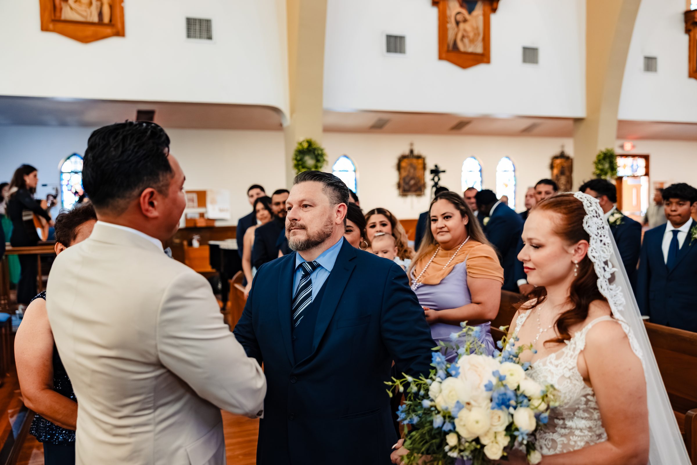 The father of the bride meeting Isaac at the altar