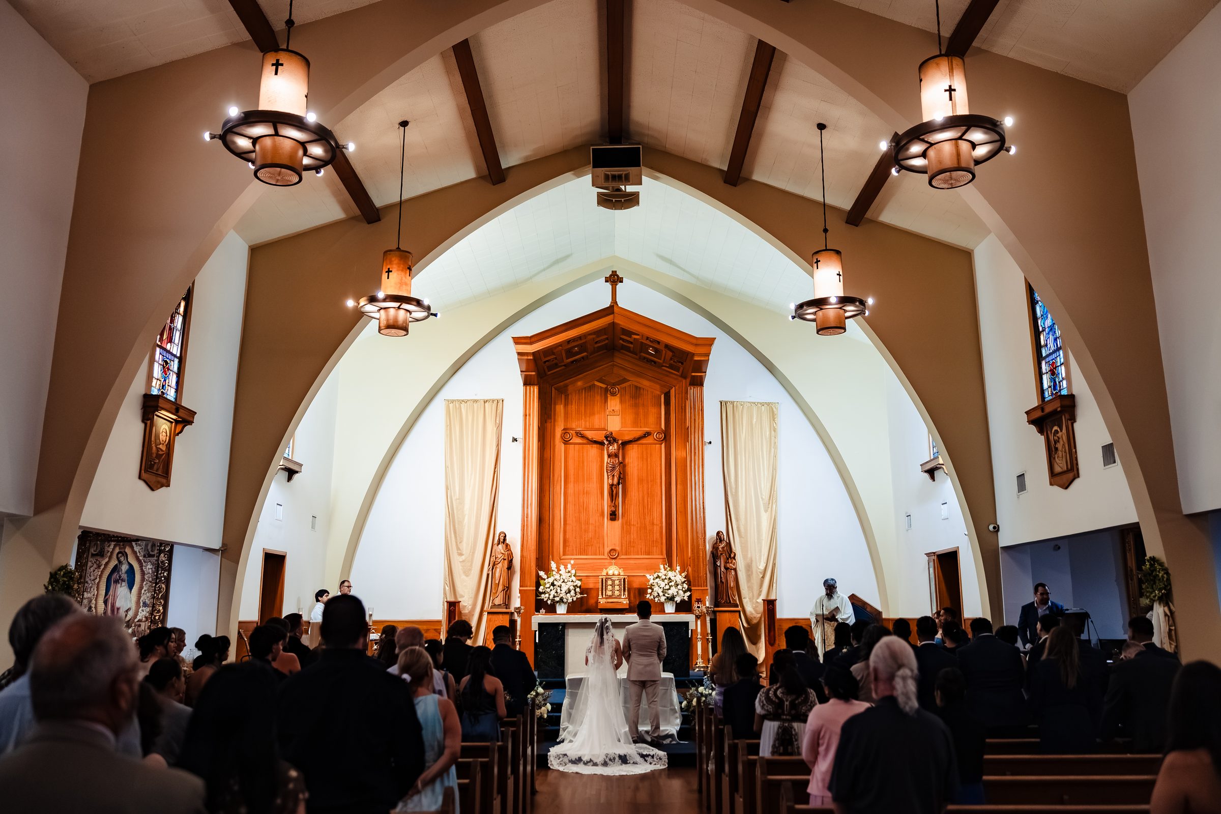 Wide view of the Nuptial Mass inside Saint Anne's Catholic Church
