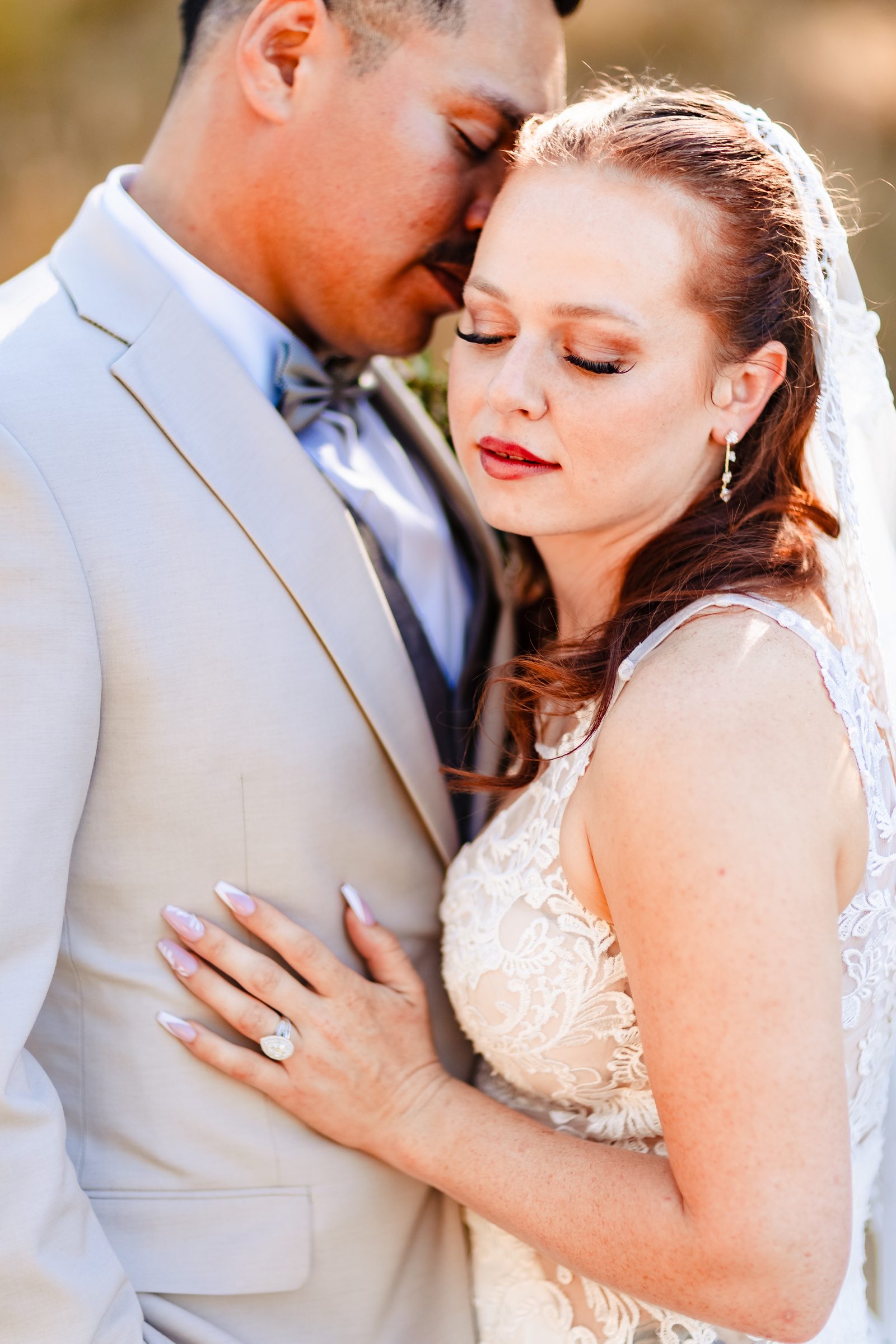 Close portrait of the newlyweds in golden light
