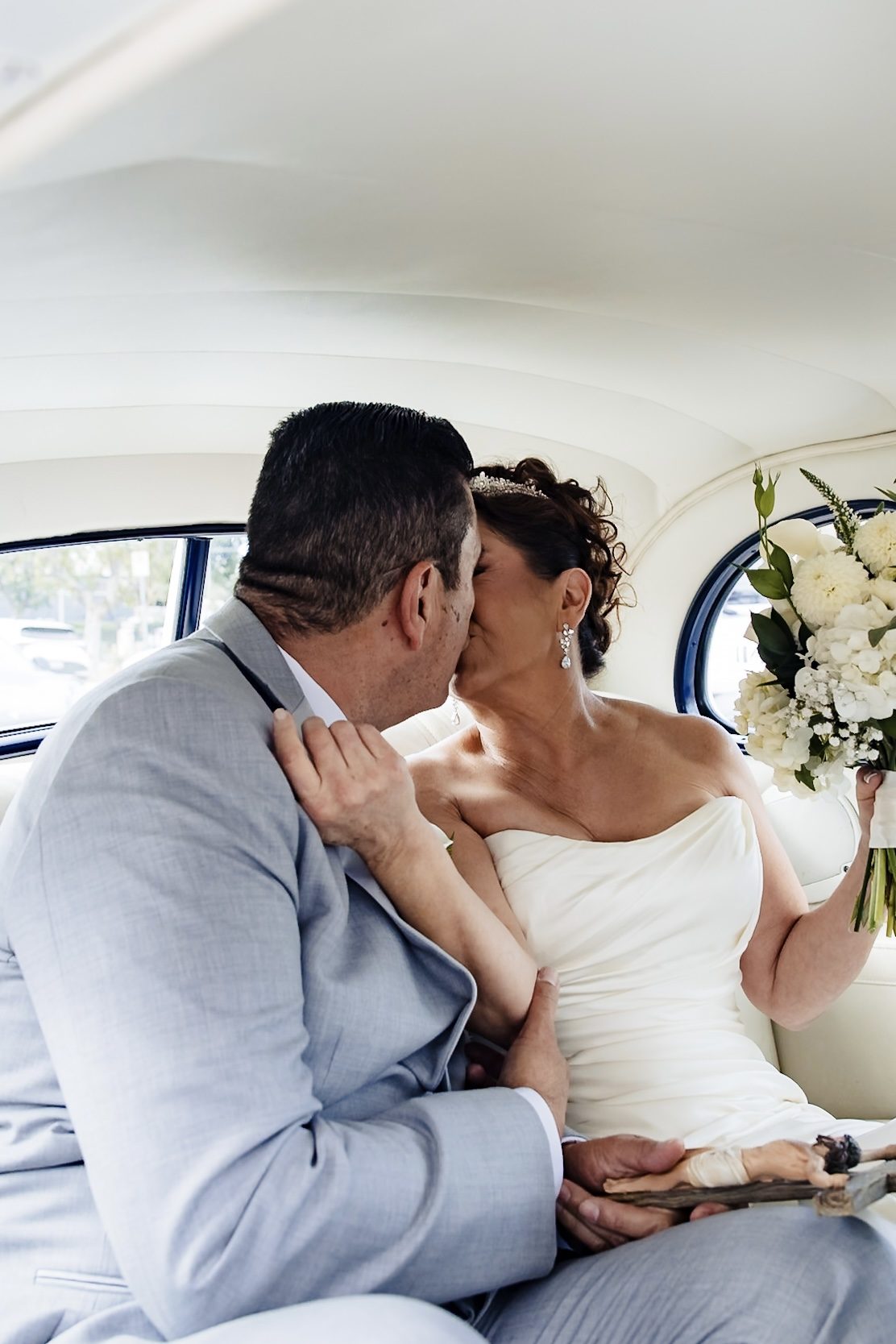 A kiss in the back seat of the Chrysler, a crucifix in Joe's hand