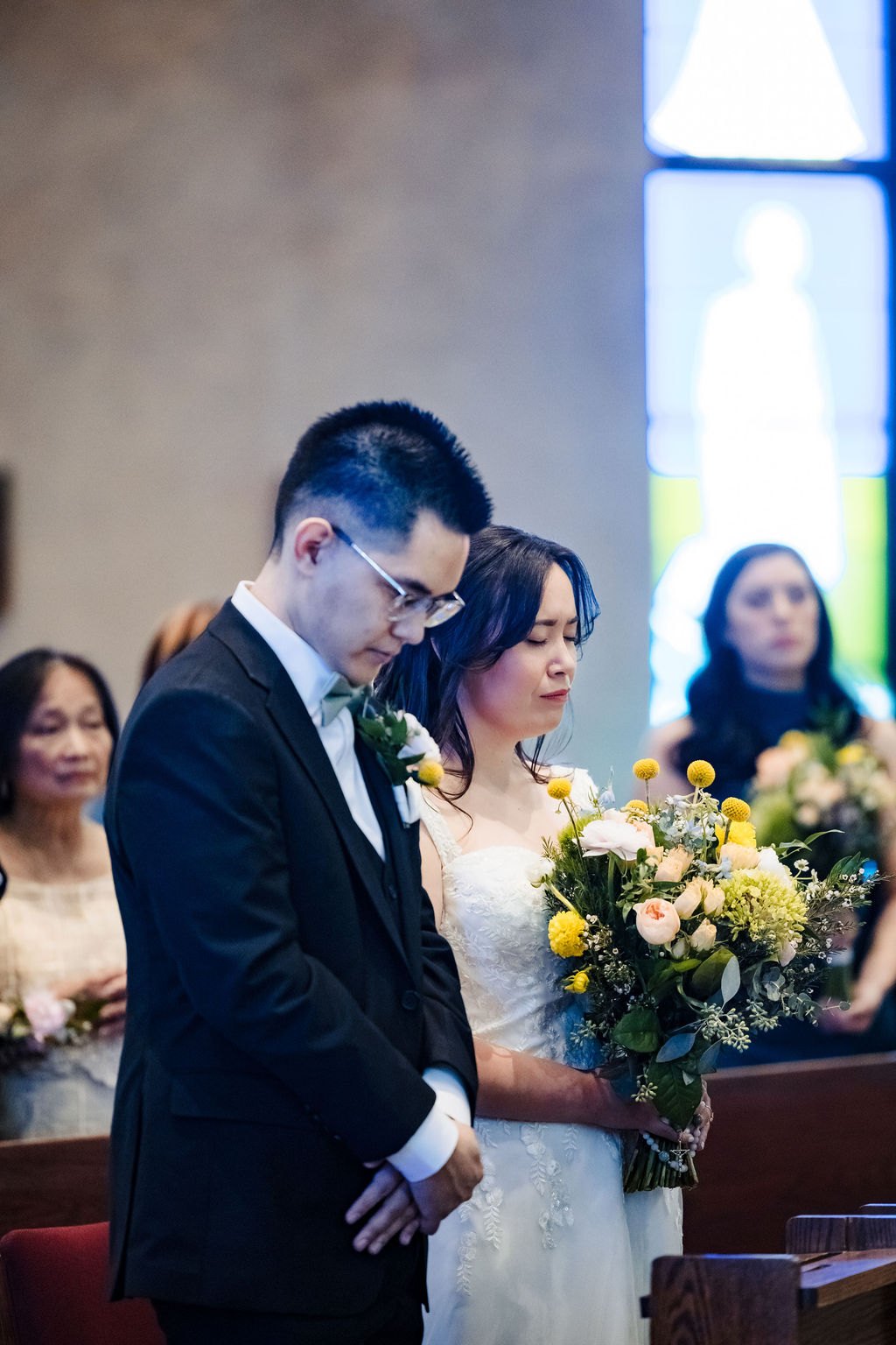 Vincent and Ginger standing together during the Liturgy of the Word